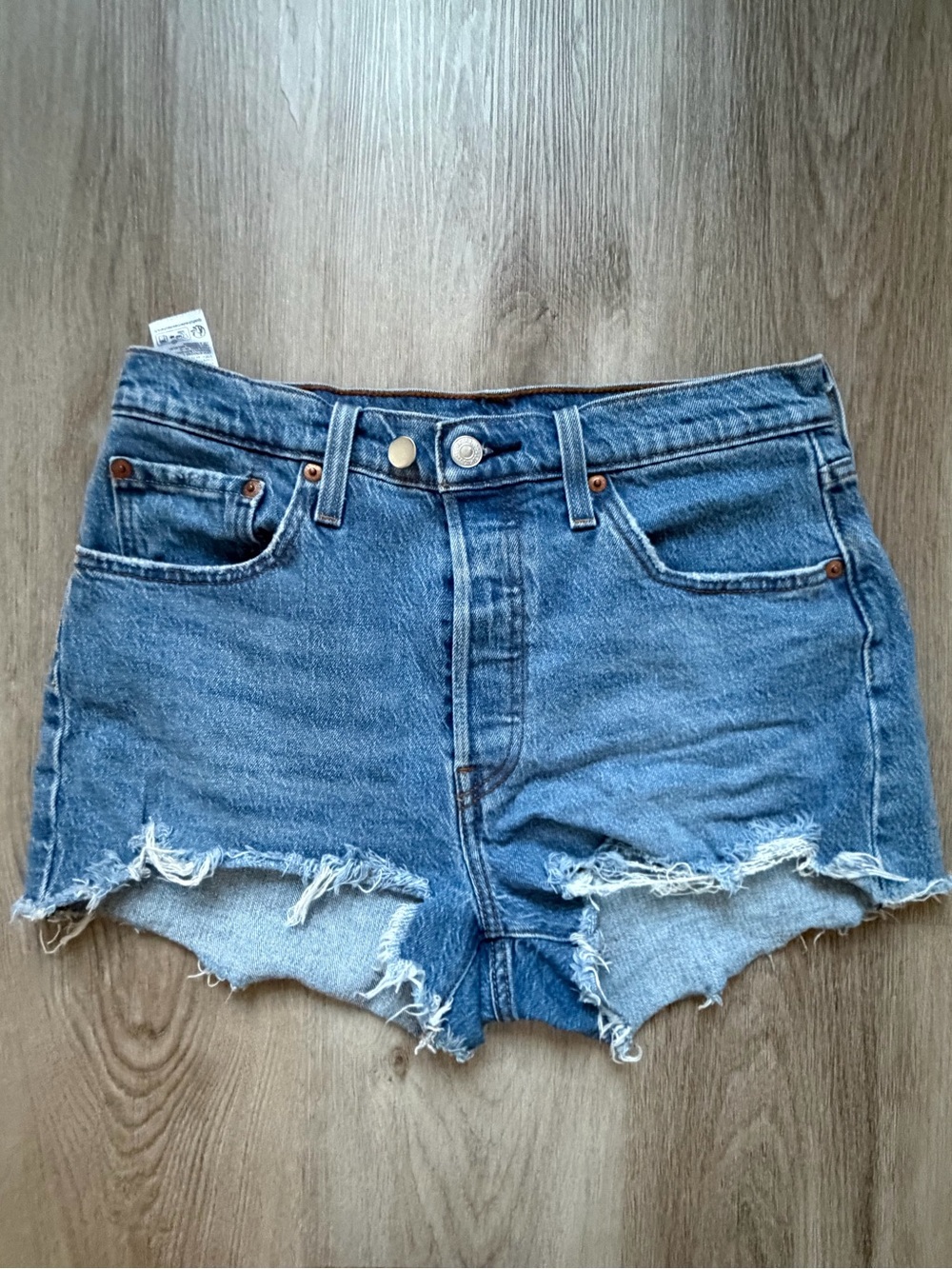 Levi 501 Frayed Hem High-Rise Denim Shorts in Medium Blue